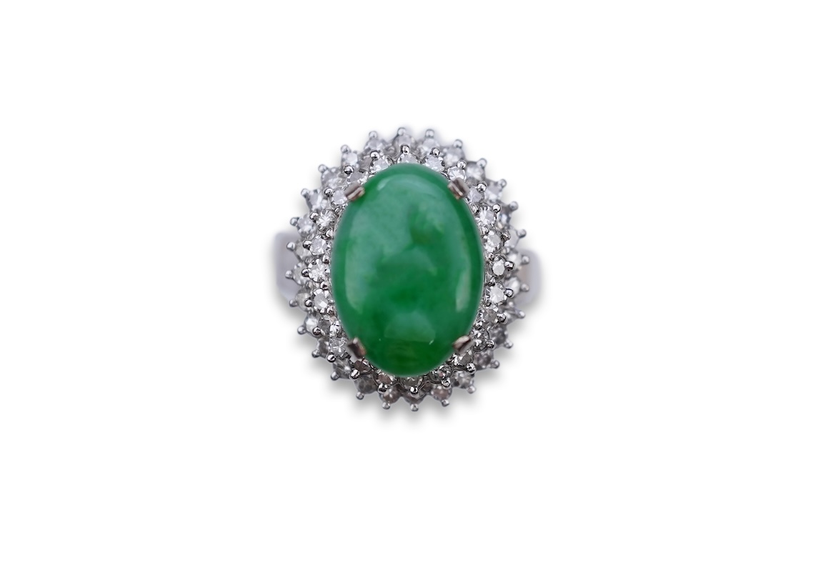 A jadeite and diamond ring